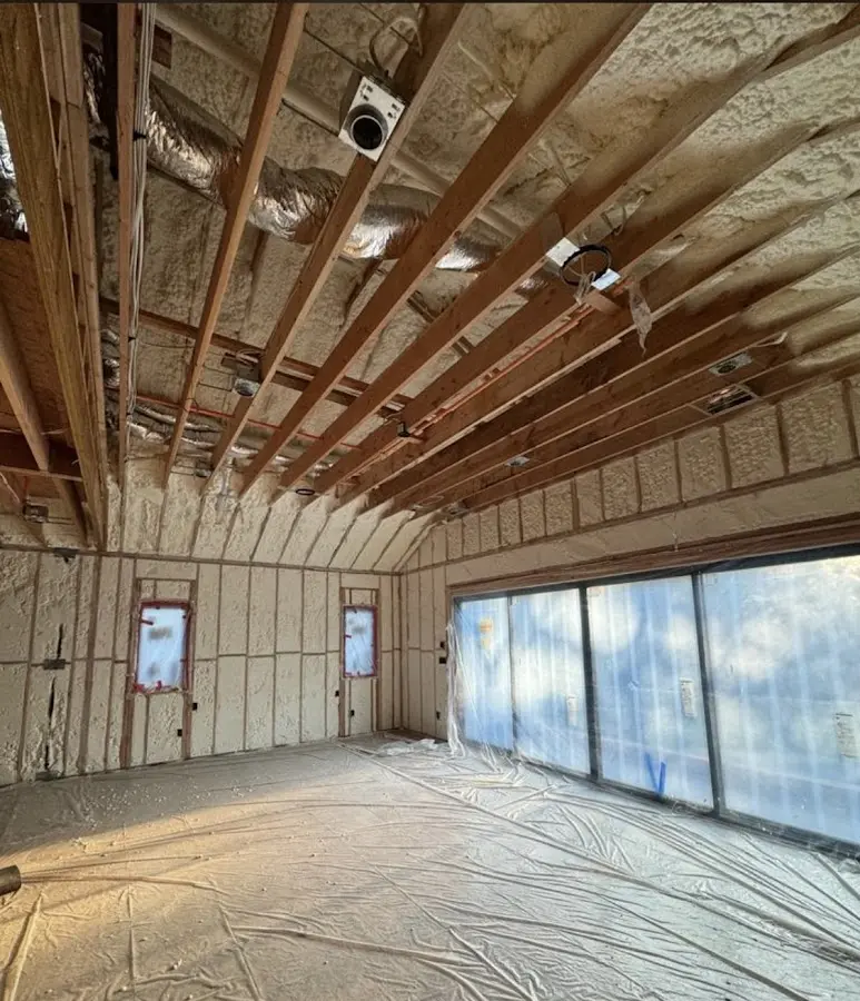 Interior walls and ceiling insulated with spray foam during new construction in Beachwood